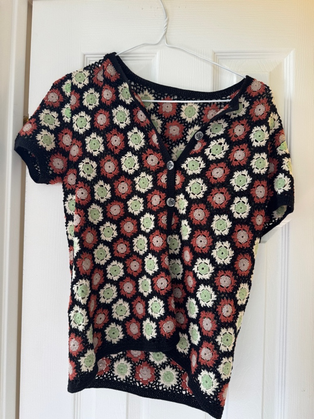 Black Crochet Short-Sleeve Button Top with Green and Rust Floral Motif